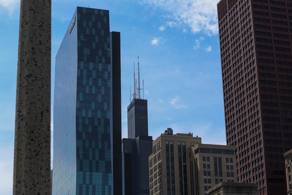 a group of tall buildings sitting next to each other