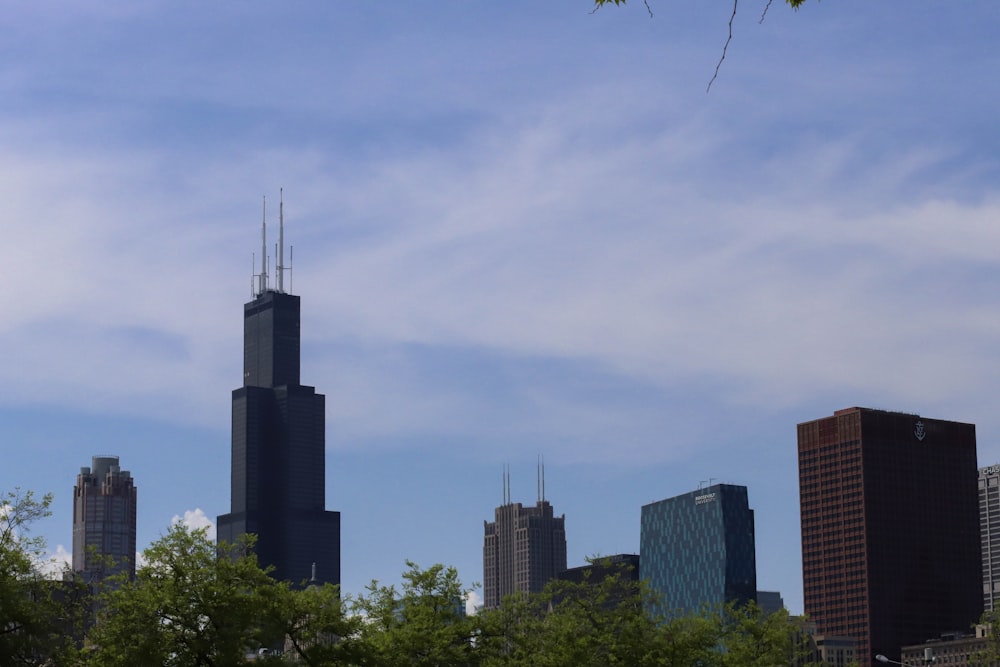 a view of a city with tall buildings