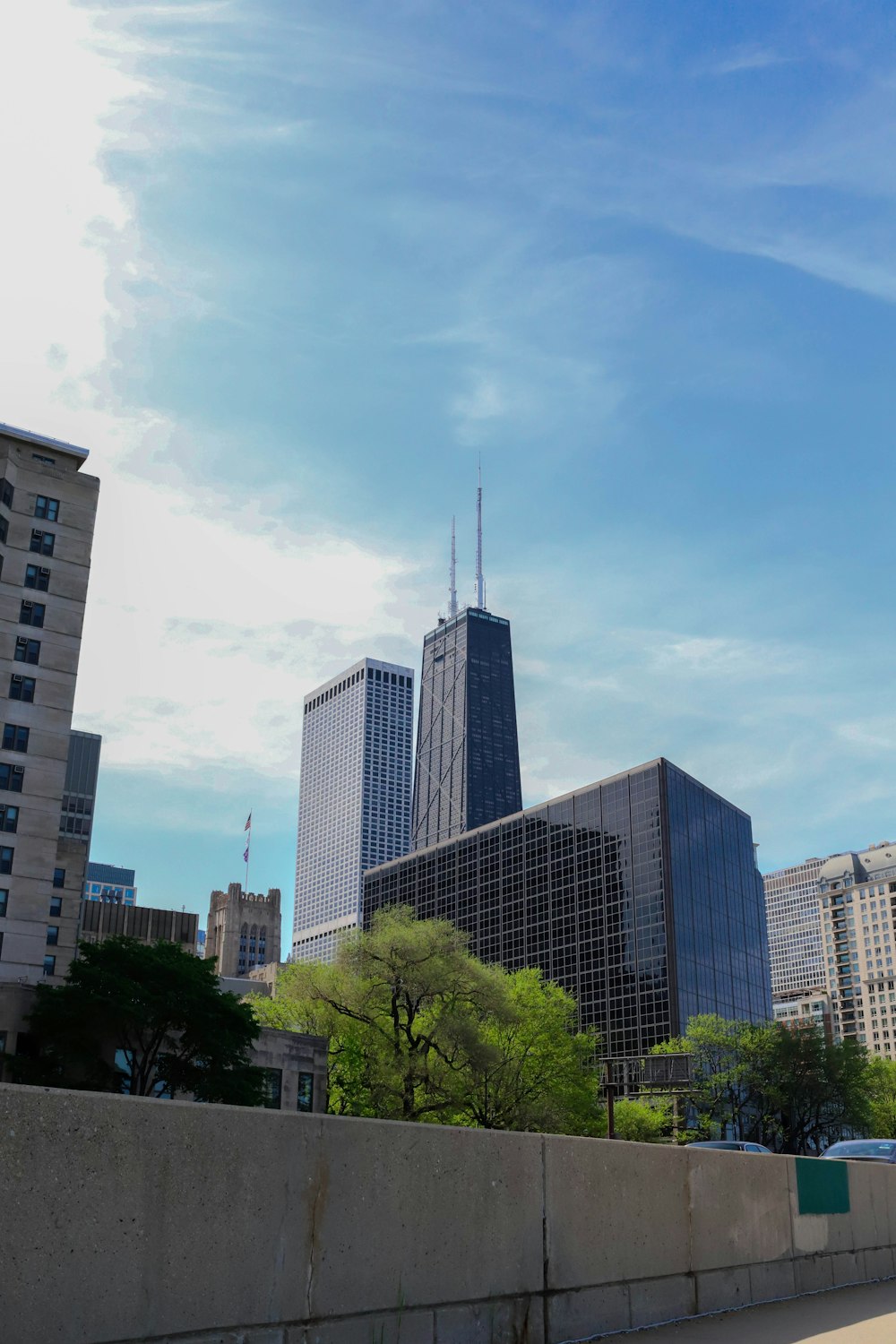 a view of a city with tall buildings