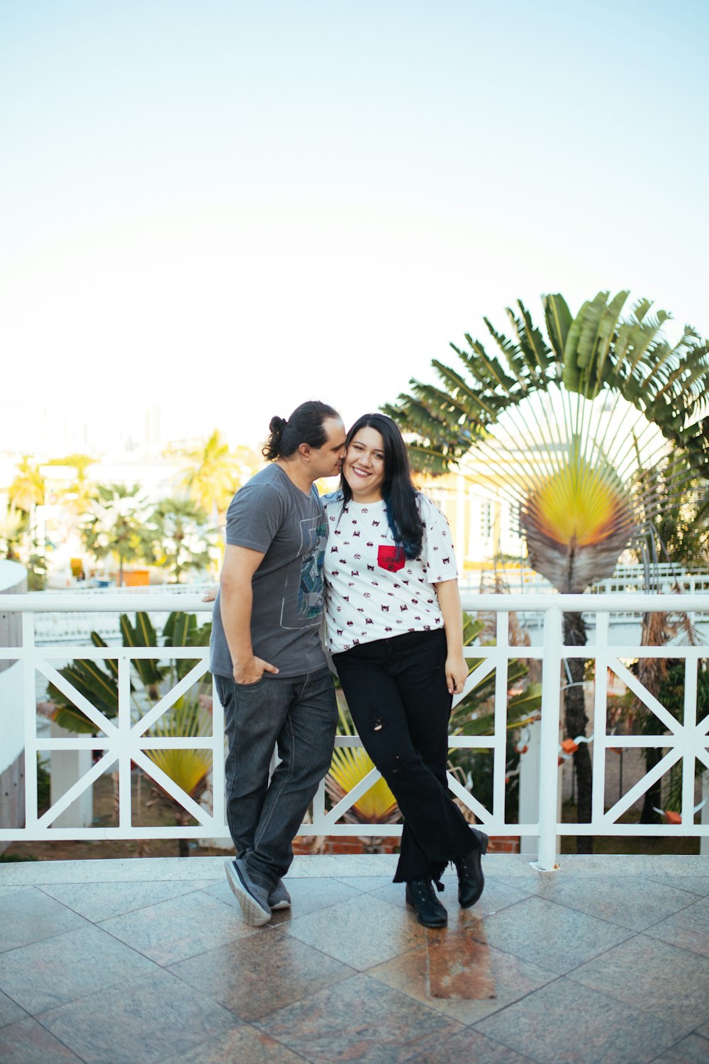 a man and a woman standing next to each other