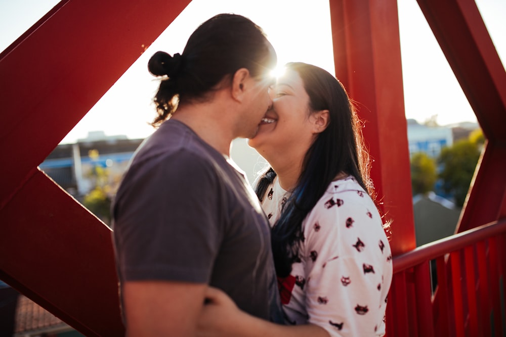 a man and a woman standing next to each other