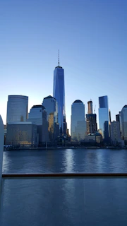 A striking early morning view of the Houston skyline with sunlight reflecting off the glass skyscrapers.