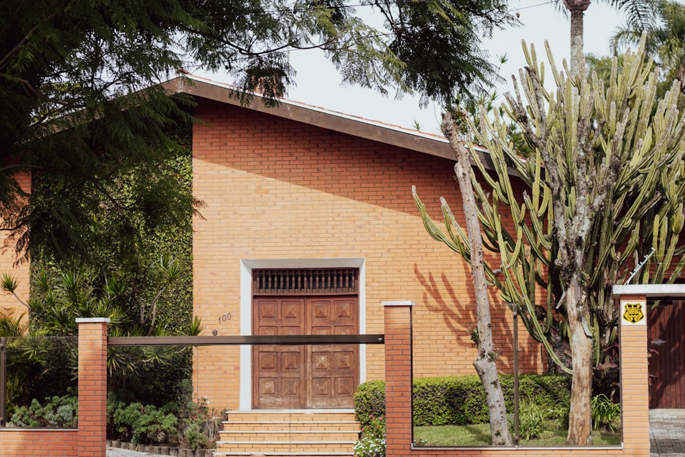 a red brick building with a wooden door