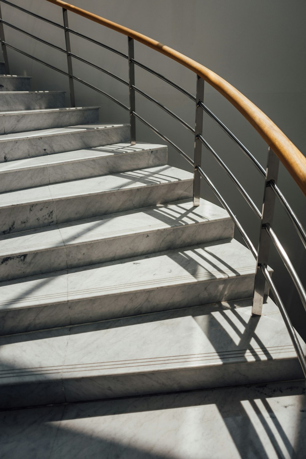 a close up of a metal and wood staircase