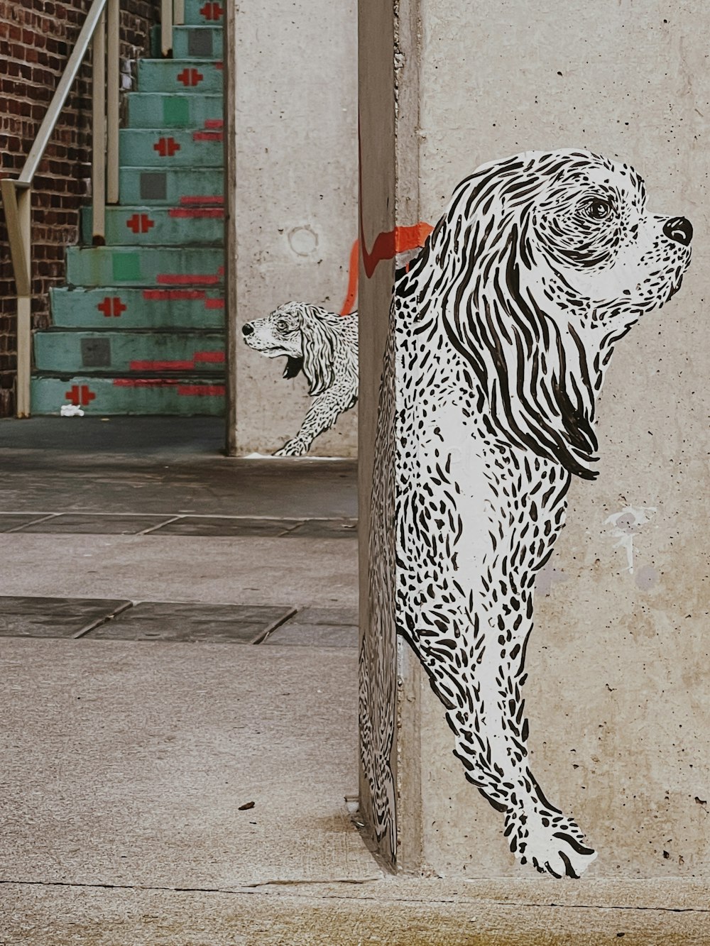 a painting of a dog on the side of a building