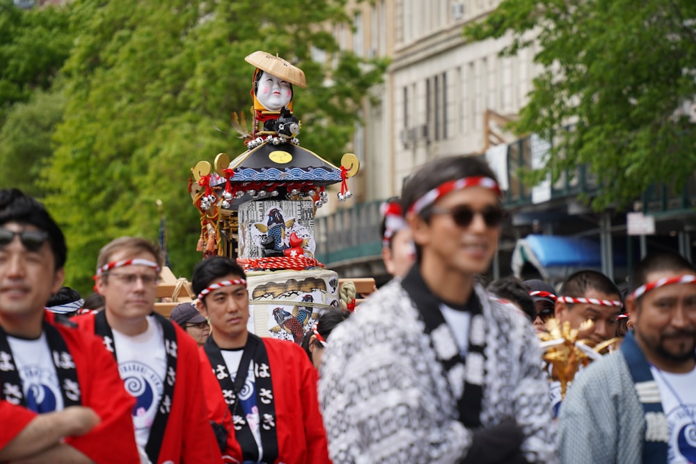 a group of people walking down a street