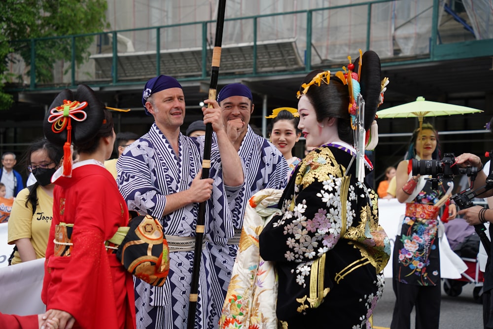 a group of people standing next to each other