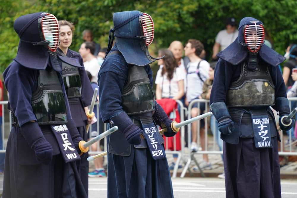 a group of people in costume standing next to each other