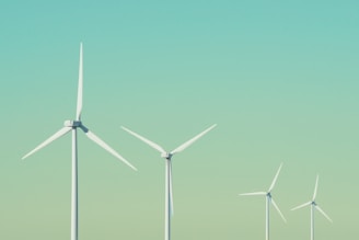 a group of wind turbines in a field