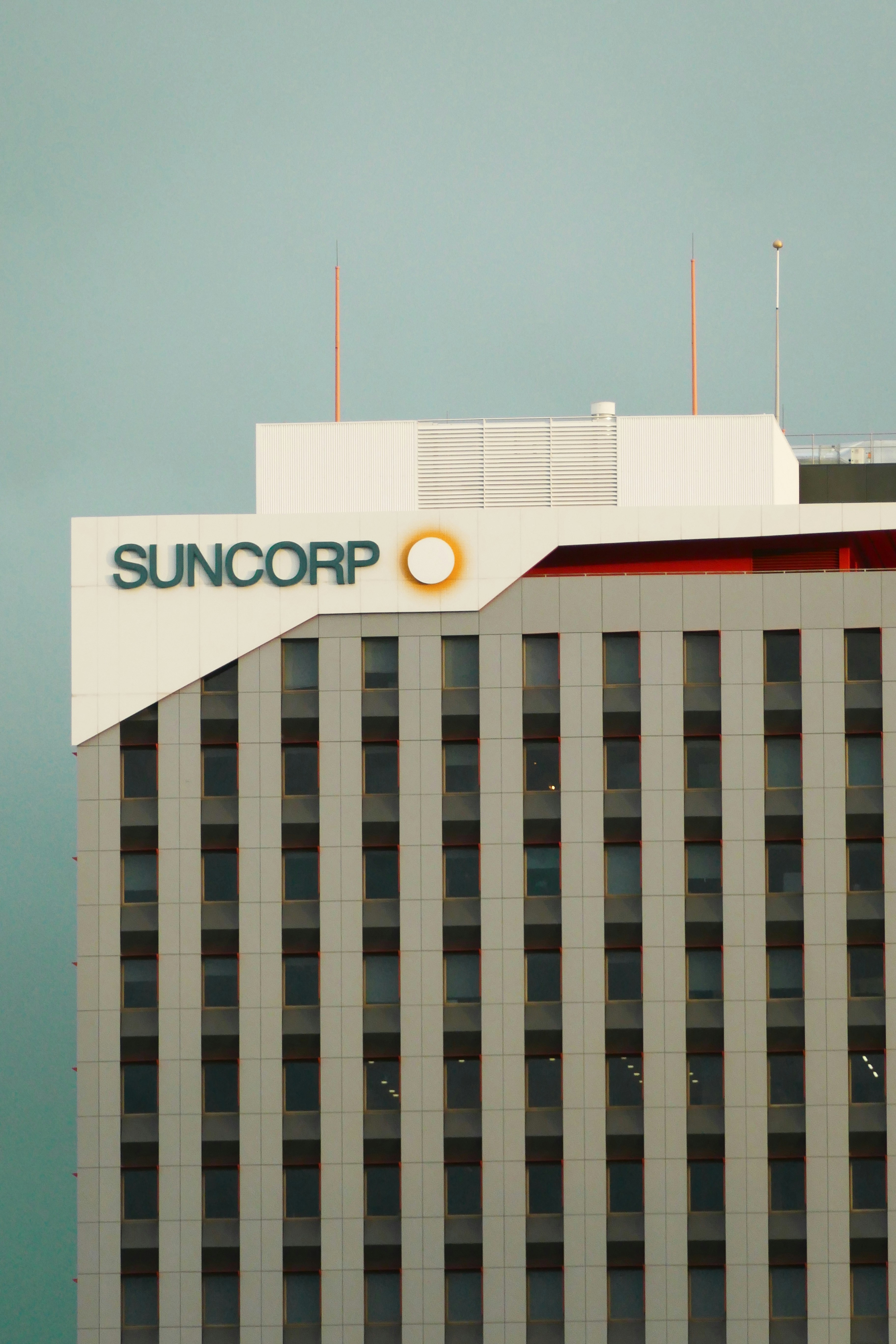 the sunocop logo on top of a building