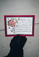 A clean navy blue and gold card showing a Sunday worship service with people gathered in prayer.
