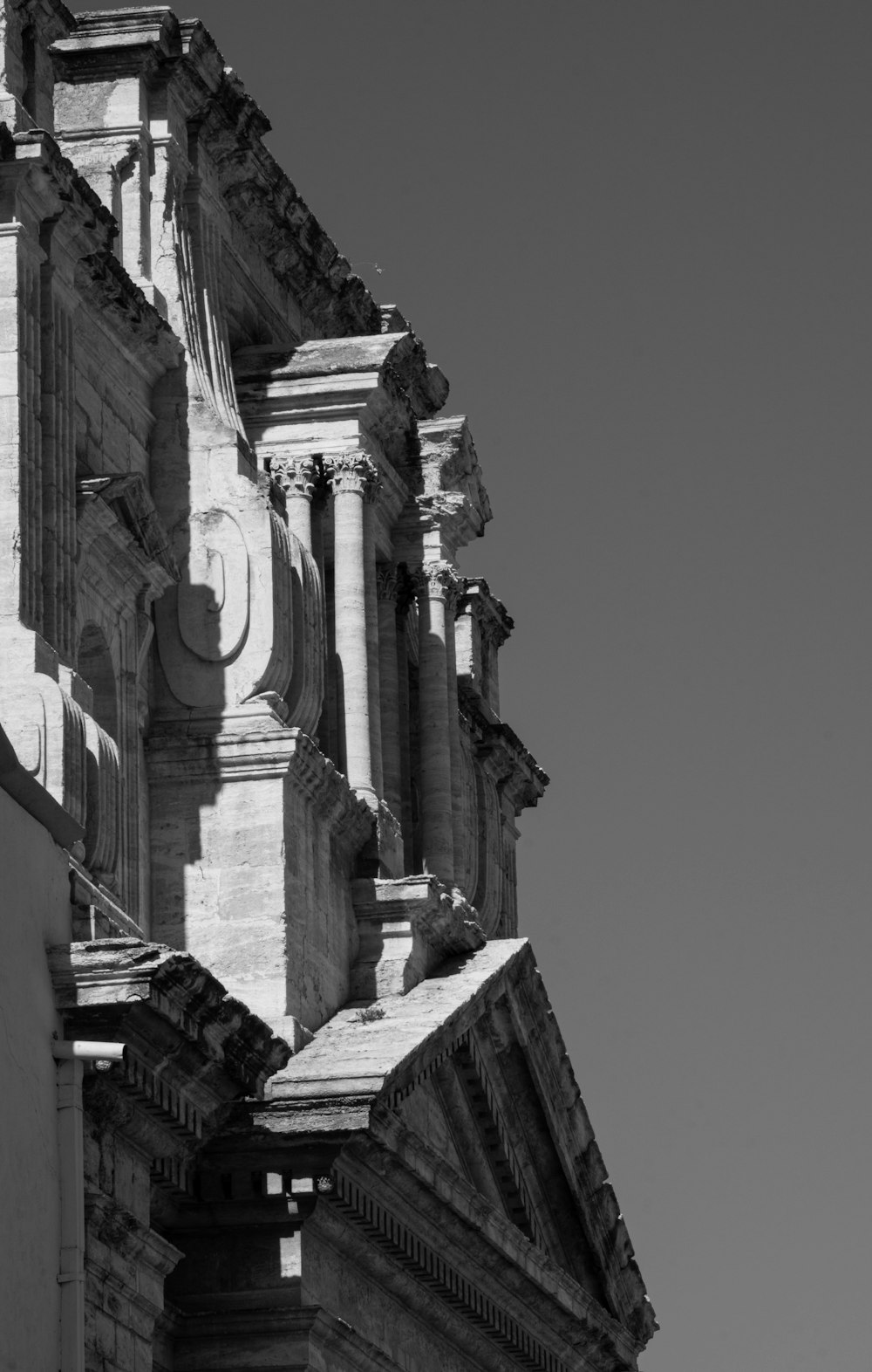 a black and white photo of a clock tower