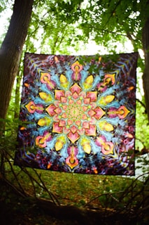 A stunning piece of psychedelic folk art with intricate designs in vivid colors.