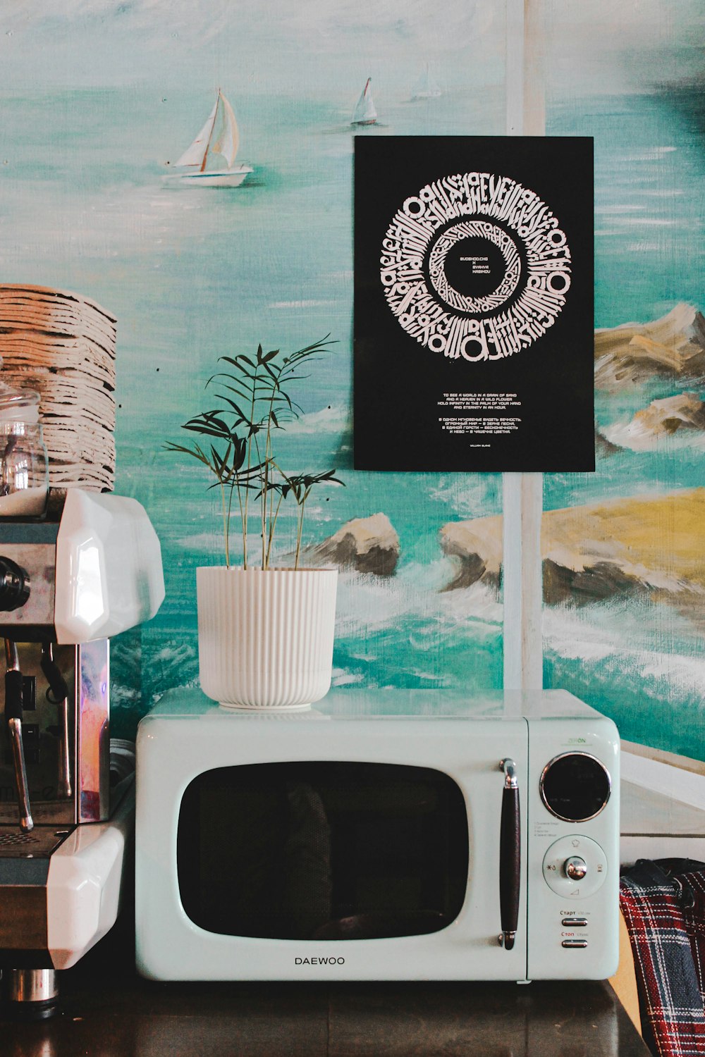 a white microwave oven sitting on top of a counter