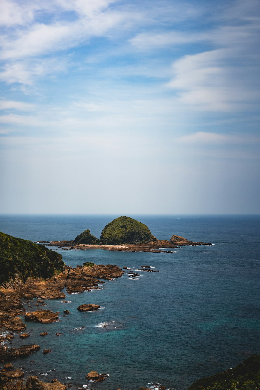 a body of water surrounded by land and water