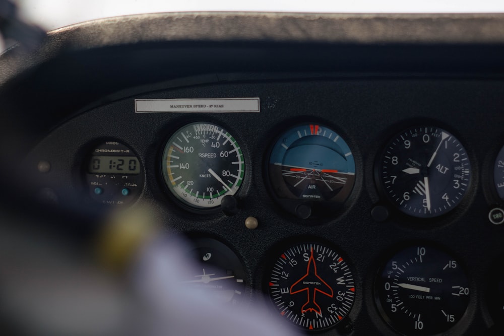 a close up of a dashboard of a plane