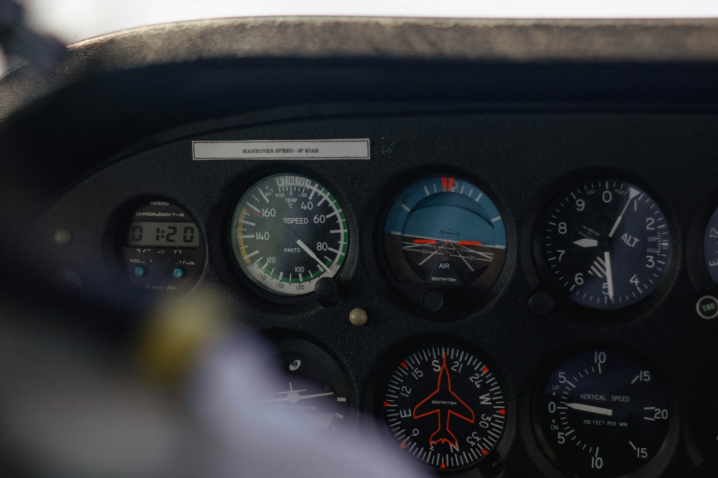 Close-up of the analog instrument panel of a small Cessna