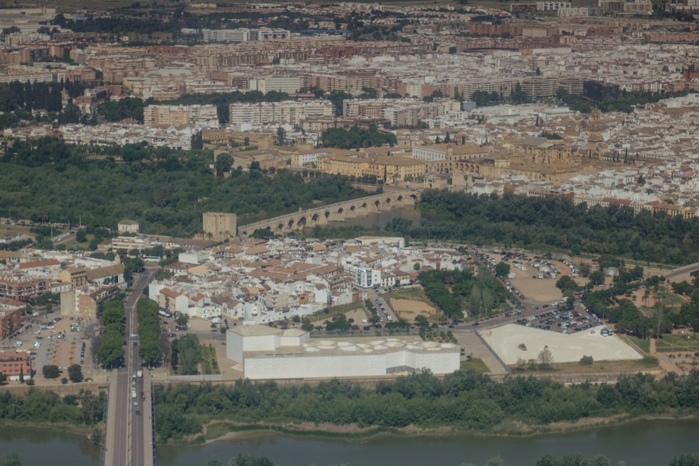 an aerial view of a city and a river