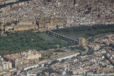an aerial view of a city with a river running through it