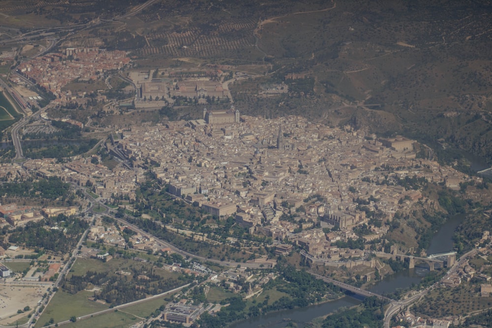 an aerial view of a city with a river running through it