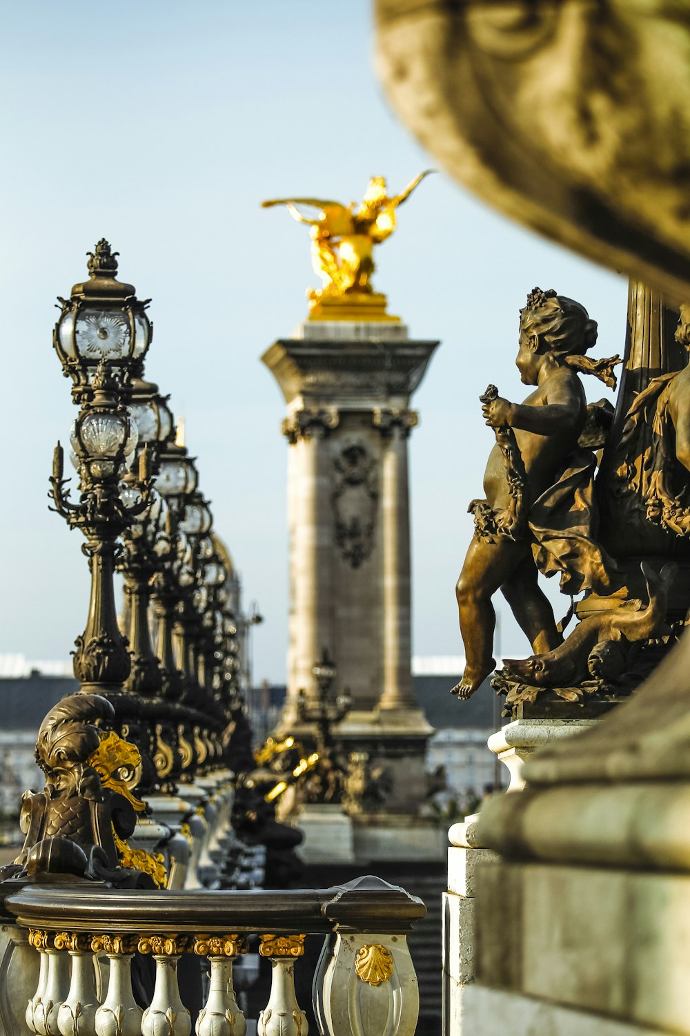 a statue of a man riding a horse next to a clock tower