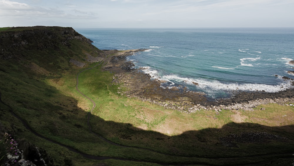 a view of the ocean from a cliff