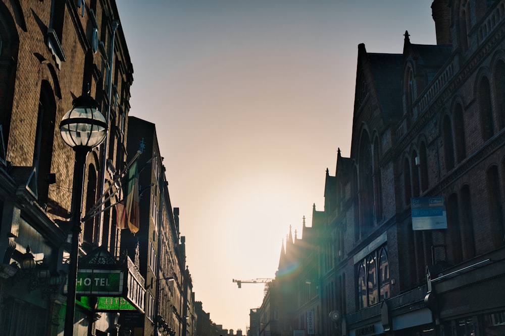 a city street with a clock on the side of it