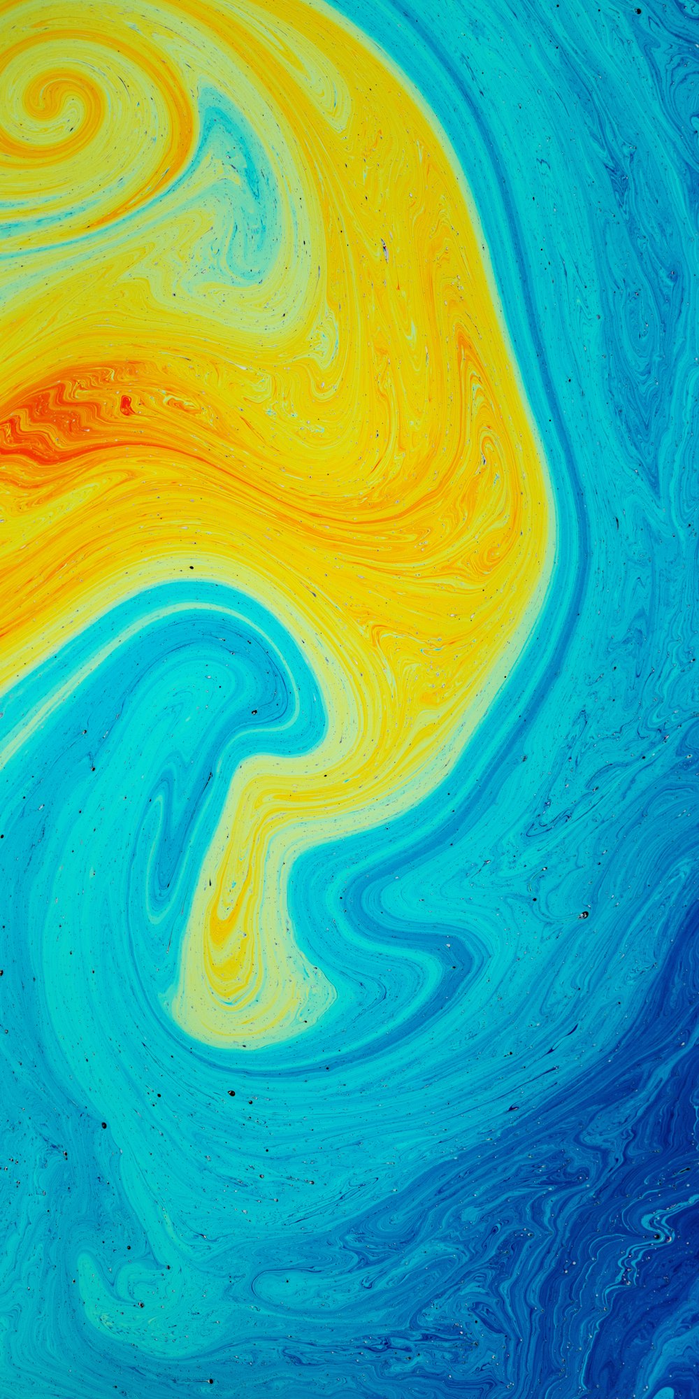 a blue and yellow fluid painting on a surface