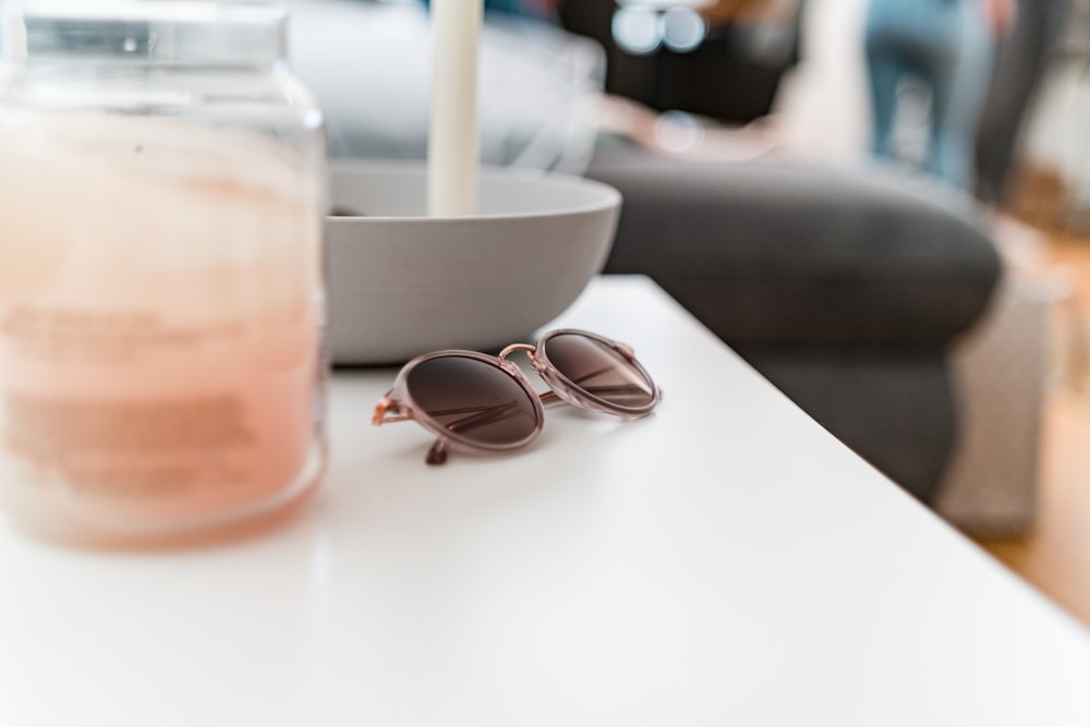 a pair of sunglasses sitting on a table