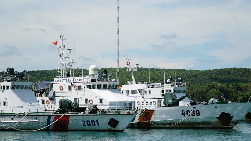 a couple of boats that are sitting in the water