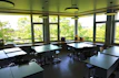 Interior view of a thoughtfully designed classroom with ergonomic furniture and learning zones.