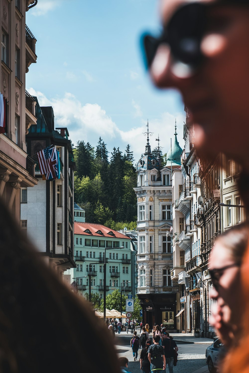 a city street filled with lots of tall buildings