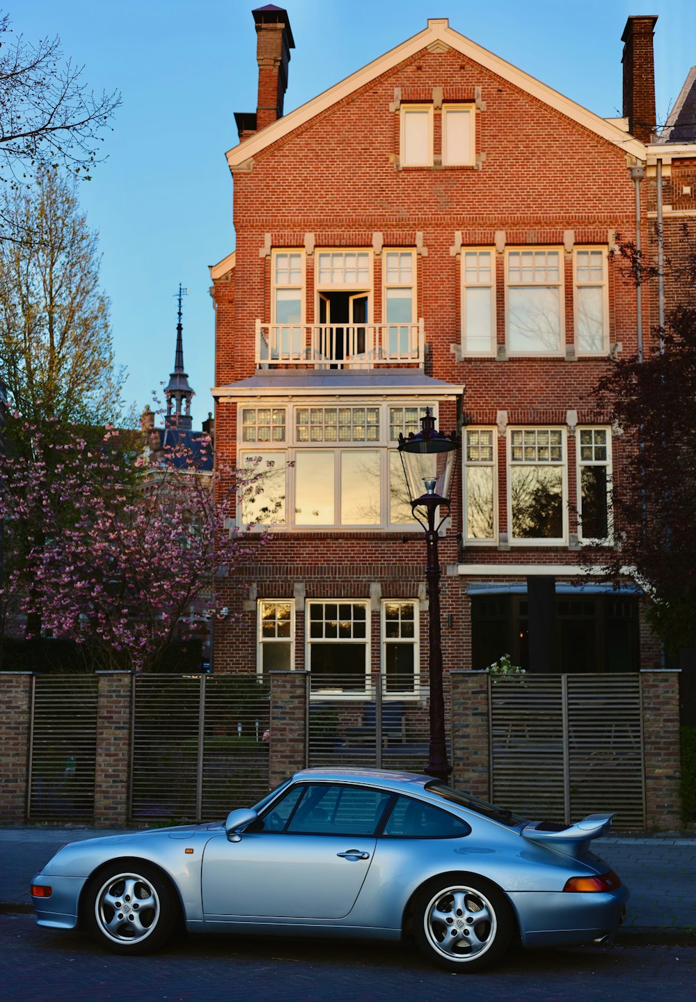 a car is parked in front of a house