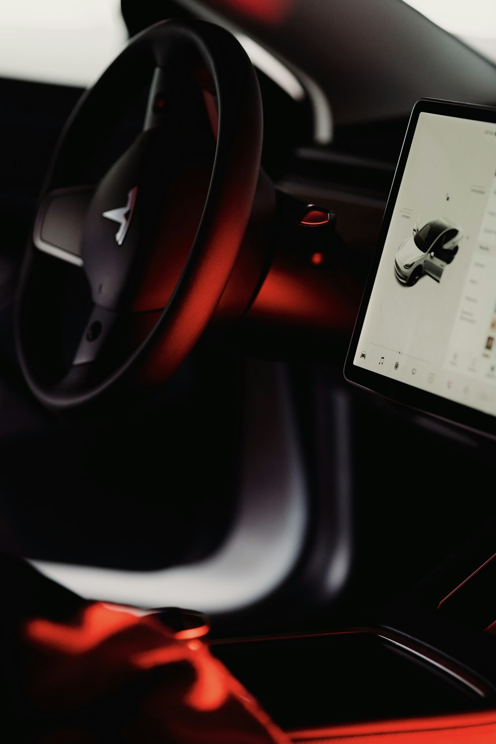 a car dashboard with a tablet on the dashboard