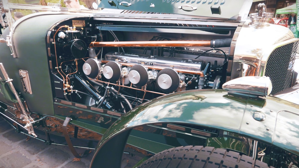 a close up of an old fashioned car engine