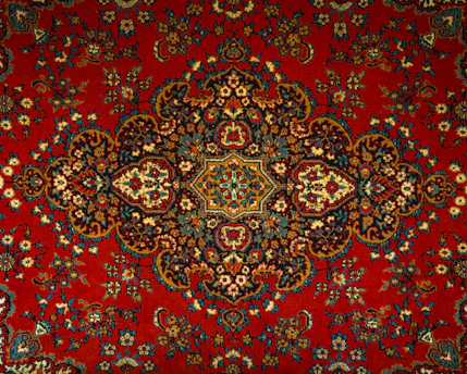 a red carpet with a colorful design on it