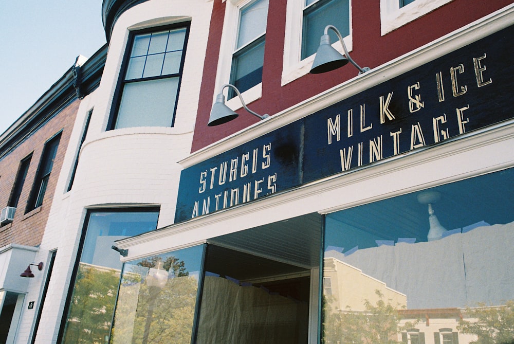 a store front with a sign that says milk and ice