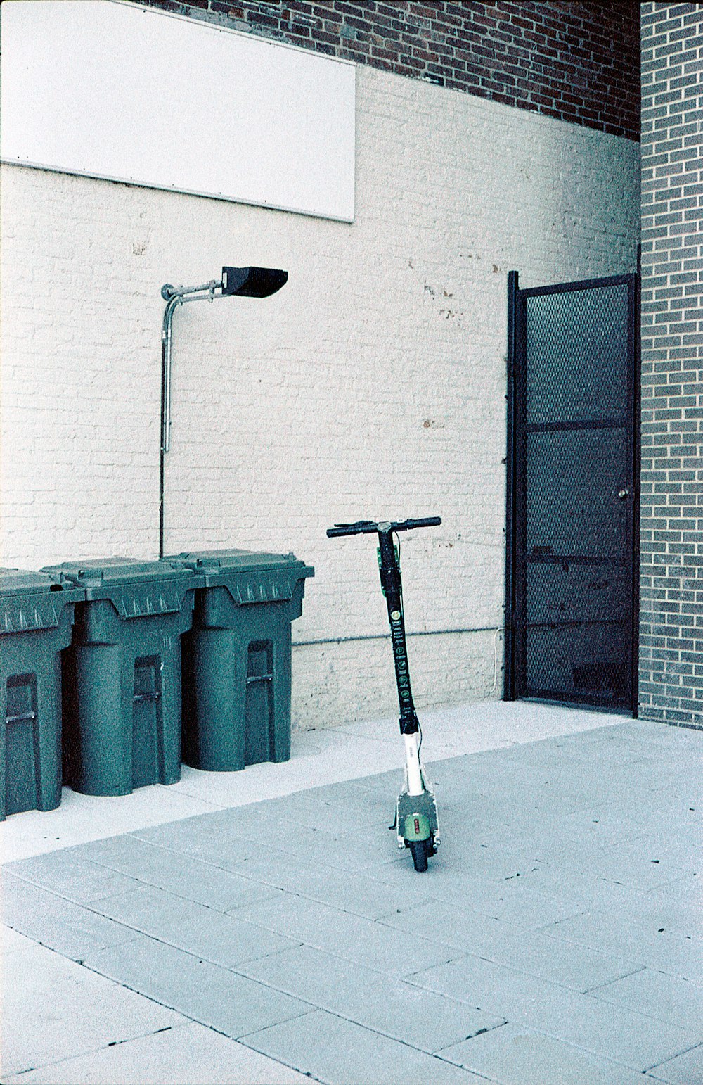 a scooter is parked in front of a building