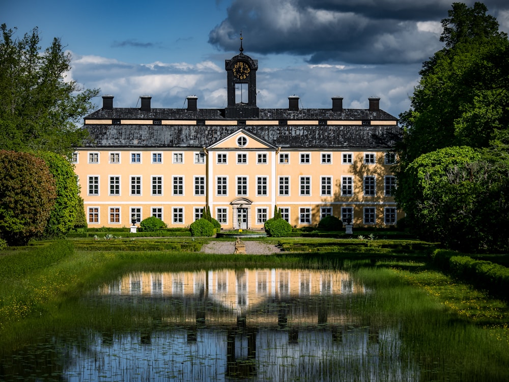 a large building with a clock on the top of it