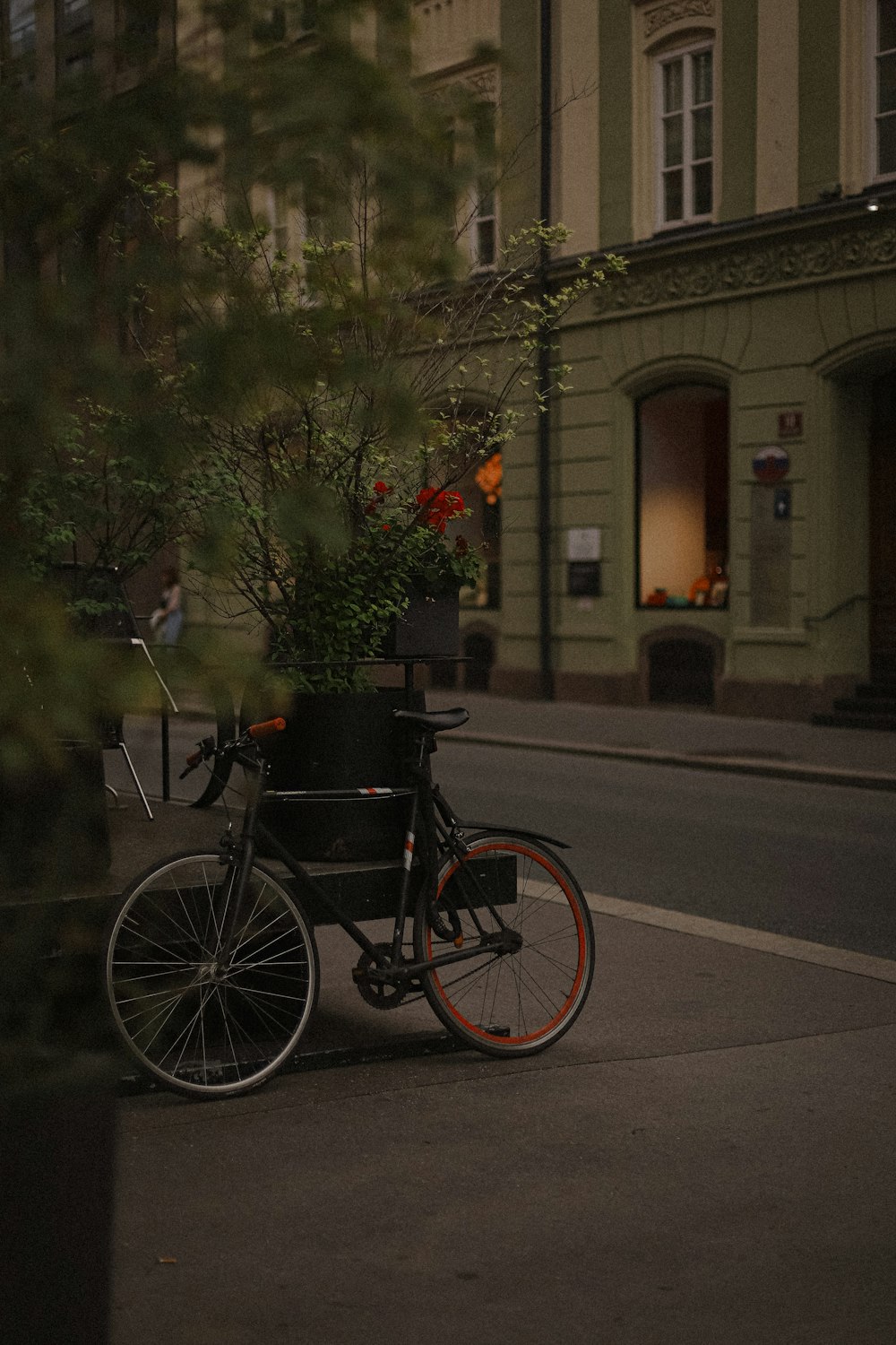 a bicycle parked on the side of the road