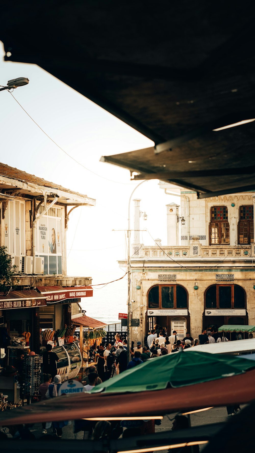 a group of people sitting outside of a building