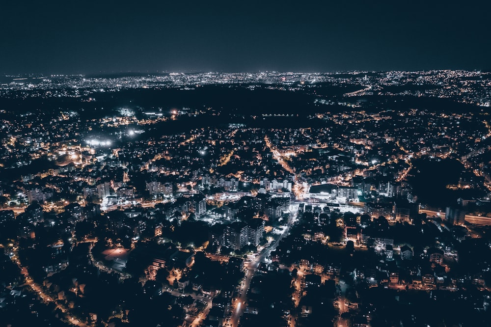 an aerial view of a city at night