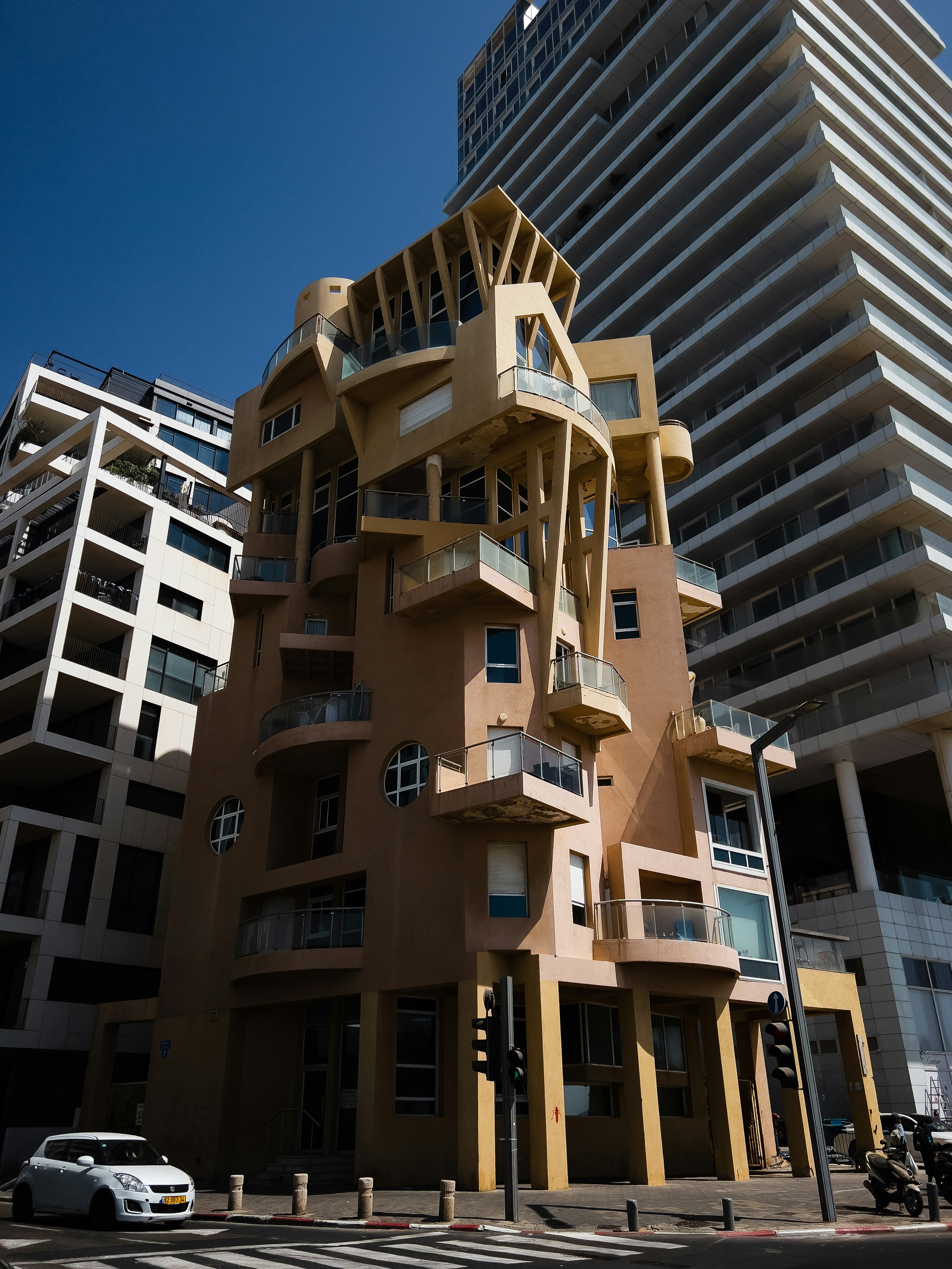 Contemporary residential building with wooden accents and modern architecture at sunset