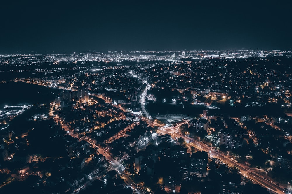 an aerial view of a city at night