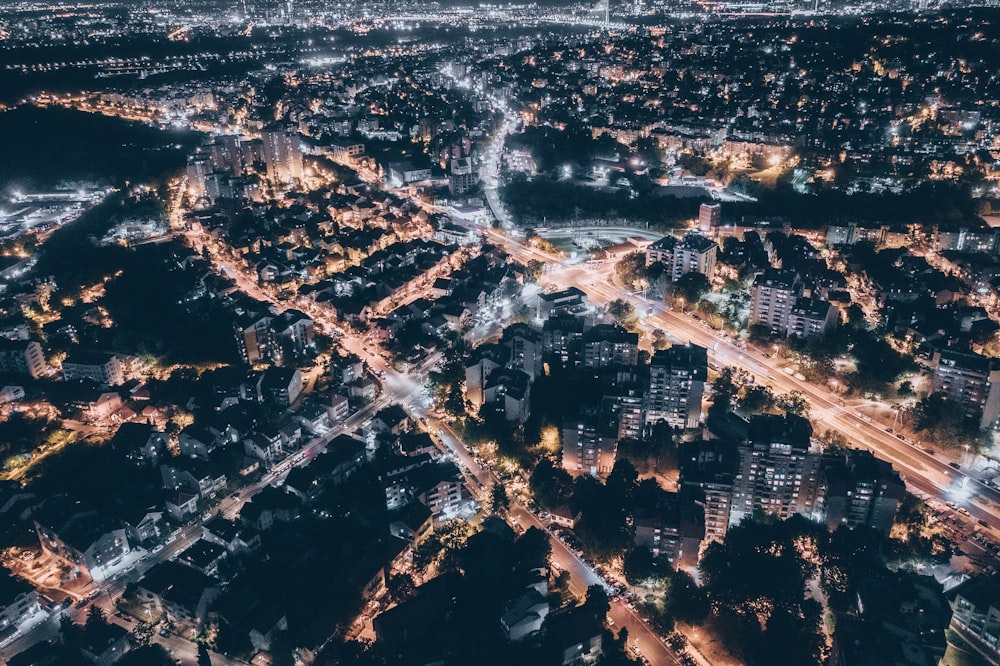 an aerial view of a city at night