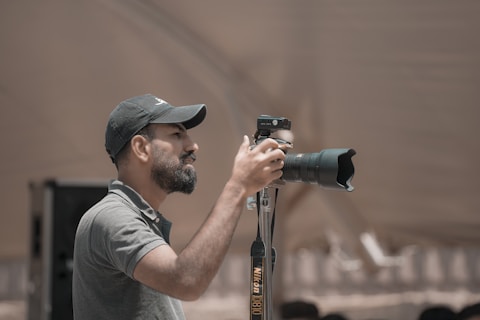a man taking a picture with a camera