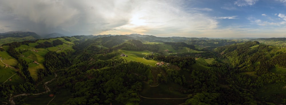 an aerial view of a lush green valley