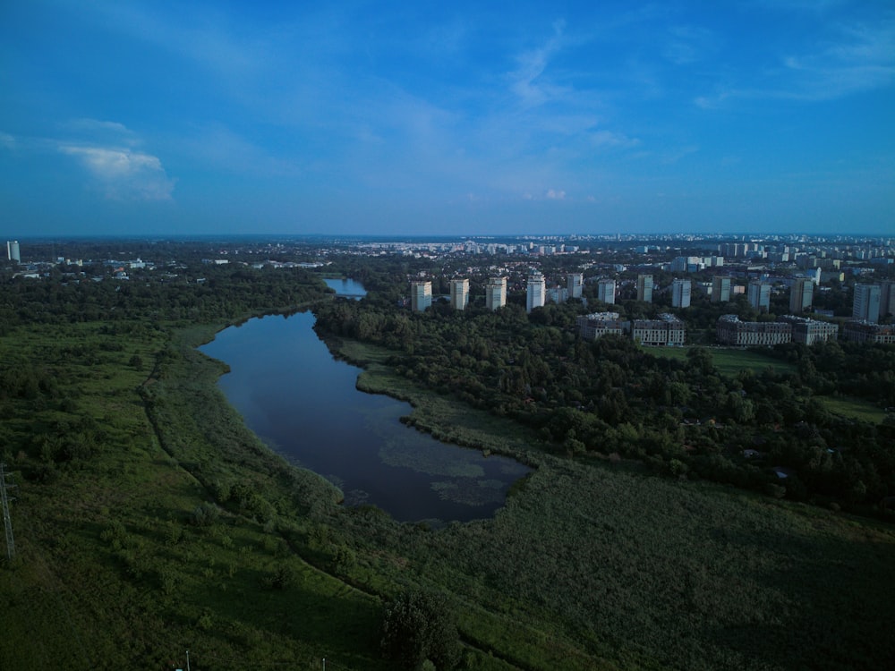 a river running through a lush green countryside