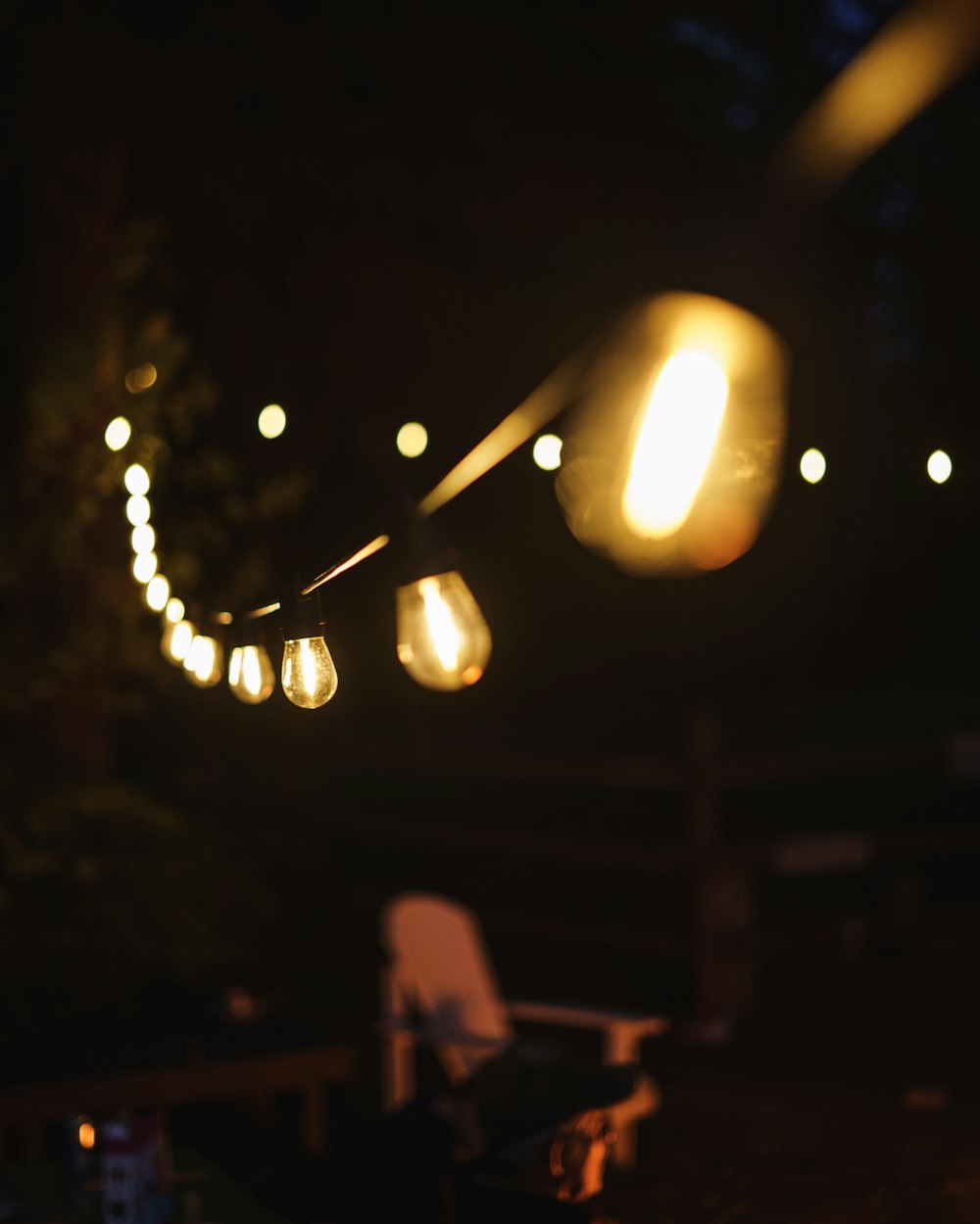 a string of lights hanging from a ceiling