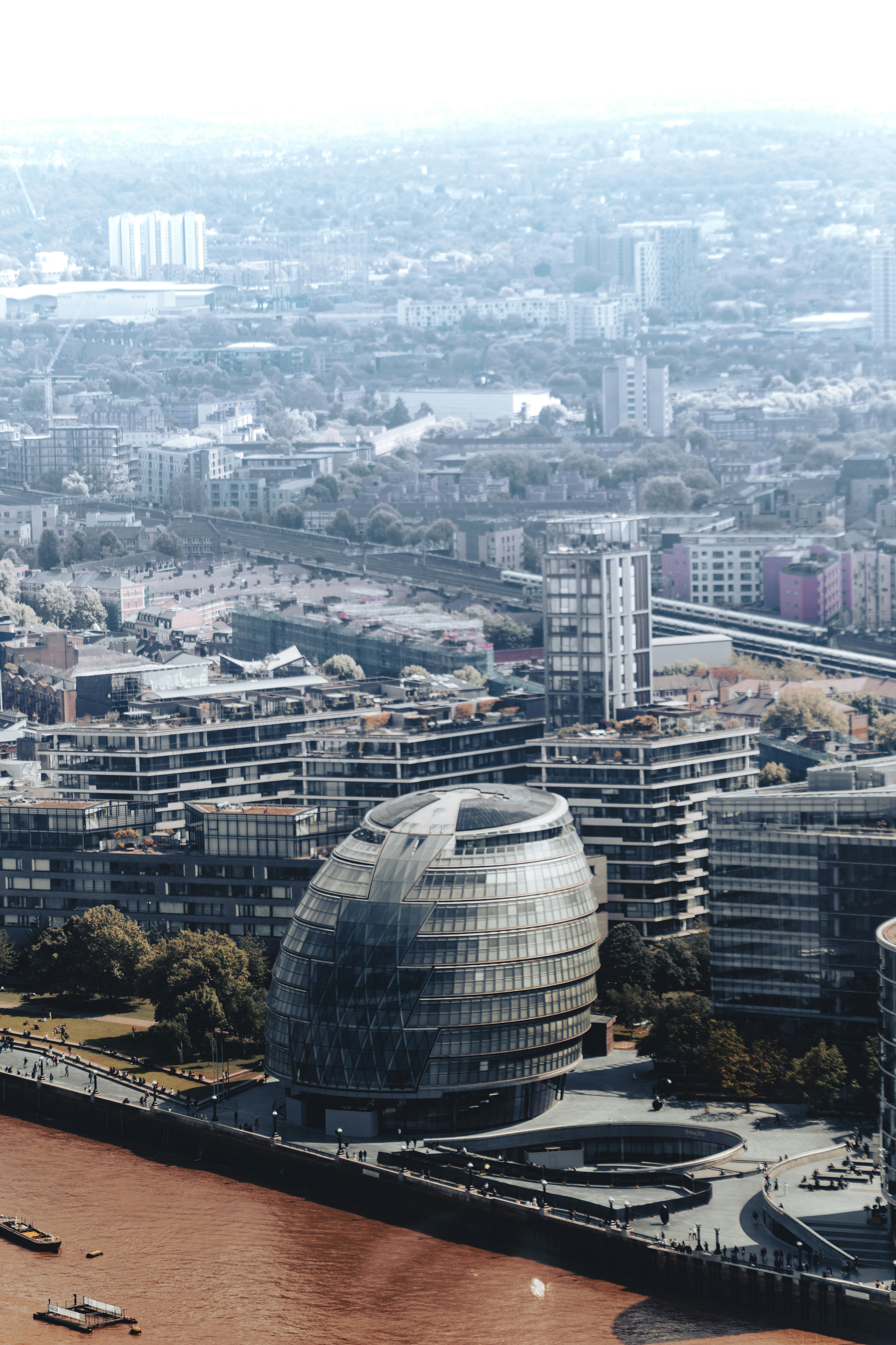 An aerial view of a city with a river running through it photo – Free ...